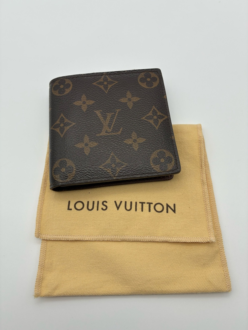 Louis Vuitton Men's Monogram Canvas Bifold Wallet - Brown